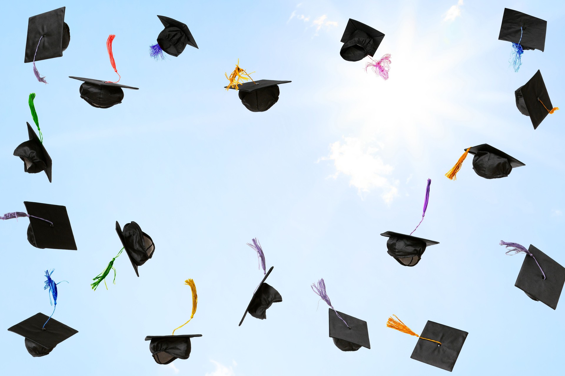 Mortarboards flying in the sky